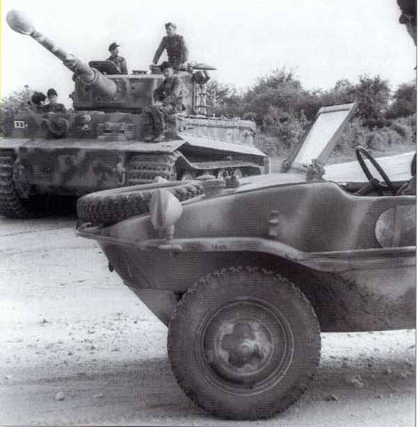 танк Тигр и военный автомобиль-амфибия танк Тигр и военный автомобиль-амфибия